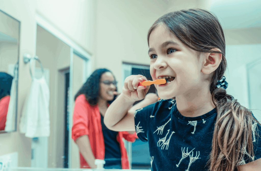 Tooth Decay in Children: Causes, Signs and Prevention 1 Child brushing her teeth