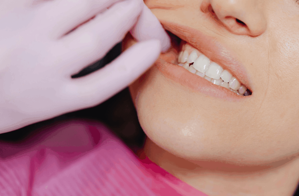 Jaw Pain: Causes, Self-Care and Who to See 1 Close-up of a person's jaw and teeth